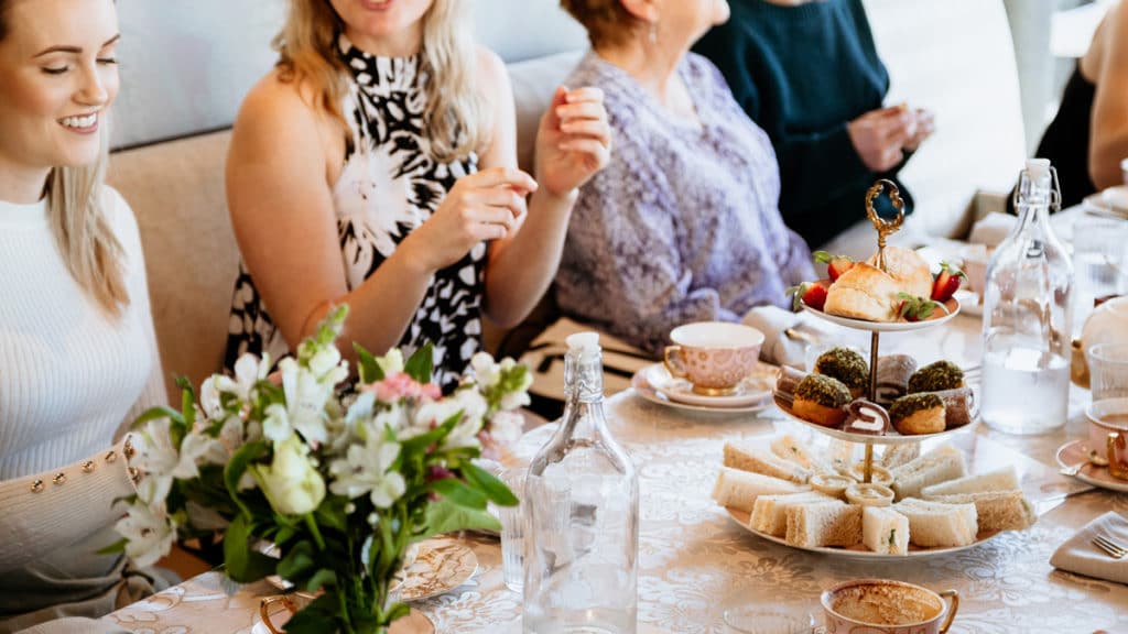 ladies enjoying high tea together