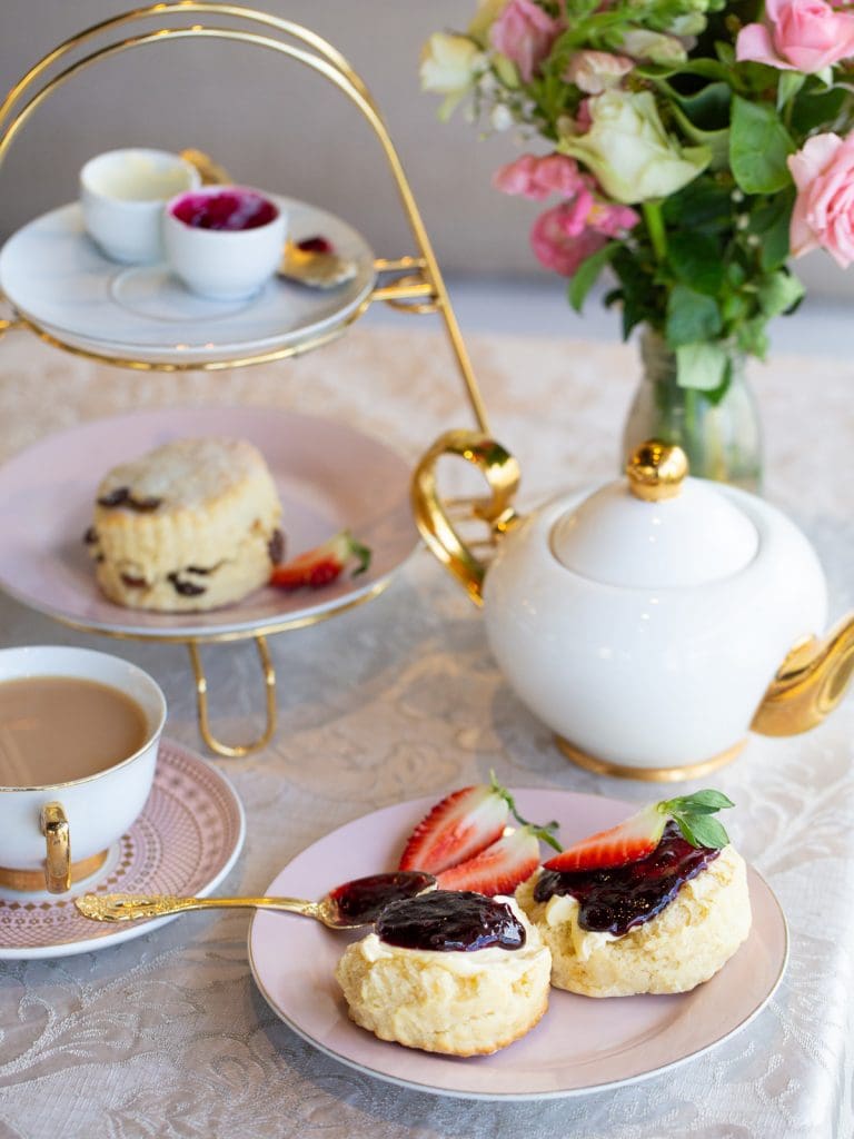 table setting of scones and tea
