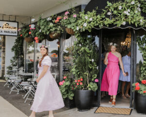 the front of Aimee Provence High Tea parlour decorated in flowers